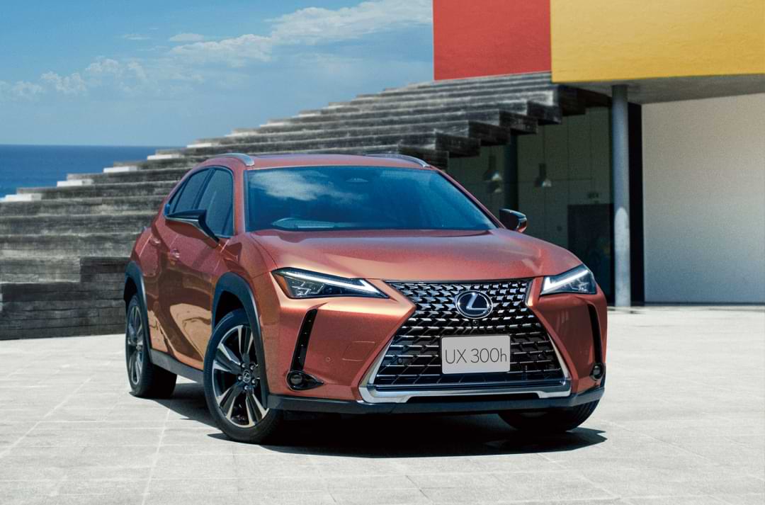 Car outside next to stairs.